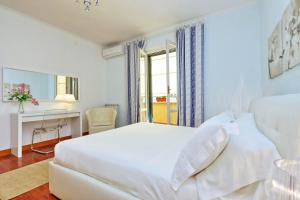 Postel nebo postele na pokoji v ubytování Mecenate Charme Apartment
