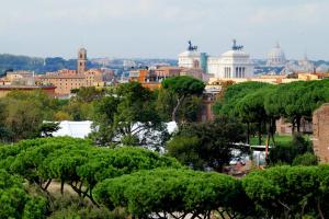 a view of a city with trees and buildings at Mecenate Charme Apartment in Rome