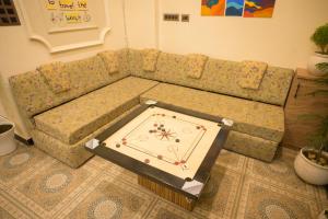a coffee table in the middle of a living room at 3 Raahi Varanasi in Varanasi