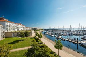 a view of a marina with boats at Lindner Hotel Boltenhagen, part of JdV by Hyatt in Boltenhagen