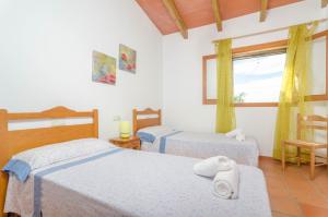 Postel nebo postele na pokoji v ubytování Torre Marina (Alga Marina) + 23 fotografií
