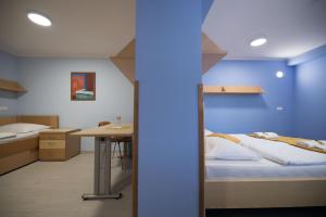 Krevet ili kreveti u jedinici u objektu S Hotel - Simple City Centre Stay