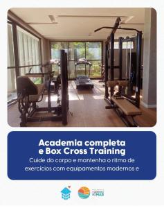 a gym with several exercise equipment in a room at AP da FLOR Guerra in Parnamirim