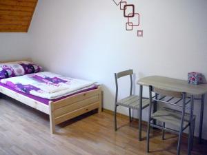 Postel nebo postele na pokoji v ubytování Ubytování nad Bisonem