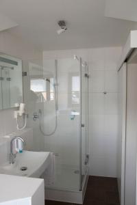 Ванная комната в Parkhotel Lindau