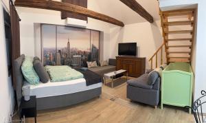 a bedroom with a bed and a view of a city at Biró Vendégház in Sármellék