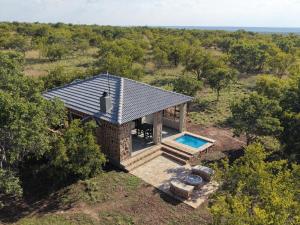 an overhead view of a house with a swimming pool at Klipdrift Sands Game Lodge in Dinokeng Game Reserve