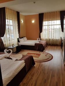 Postel nebo postele na pokoji v ubytování Motel Imperial