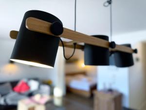 a close up of a lamp in a living room at Sonnenhof Seeg 12 in Seeg