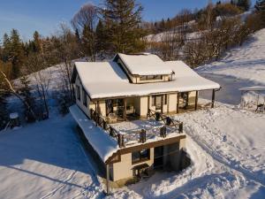 an aerial view of a house covered in snow at Shatiz in Izki