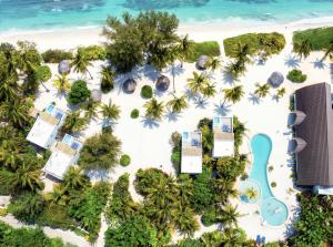 an aerial view of a resort on the beach at Kijani Beach Villas in Bwejuu