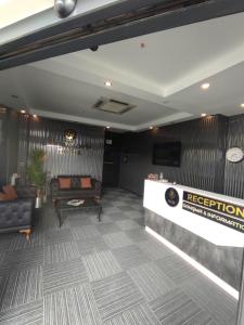 a lobby of a hotel with a reception desk at GRANDROYAL HOTEL in Gümüşyaka