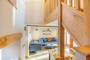 a living room with a blue couch in a house at 1 Bed in Bala oc-b27365 in Bala