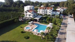 an aerial view of a house with a swimming pool at Resort Comfort - Long Beach in Ulcinj