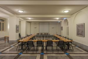 a large conference room with a long table and chairs at Pousada da Serra da Estrela in Covilhã +53 photos