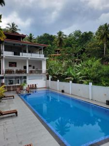 a view of the pool at the resort at The Secret Place Hotel & Resort in Kandy