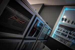 a refrigerator filled with lots of drinks in a room at Cherish Lewis Hotel Blackpool- 2 min to Beach- Smart Lock- Fast WiFi in Blackpool