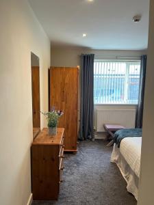 En eller flere senge i et værelse på 36 flat 1 - Room 3 + 2 billeder