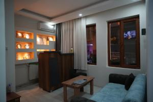 a living room with a couch and a table at BDK hotel in Istanbul