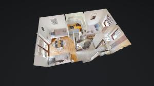 an overhead view of a house with a floor plan at Apartament Fibra Cortado in Rybnik