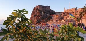 a view of the amalfi coast with a castle at Al vico1 in Campo Calabro