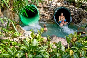 a group of people in the water in a pool at Center Parcs Erperheide in Peer