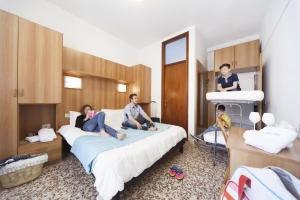 Кровать или кровати в номере Hotel del Mar