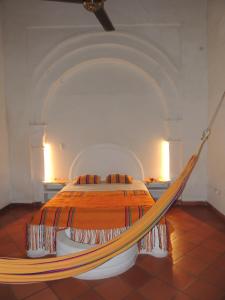En eller flere senge i et værelse på Legado de la Marquesa