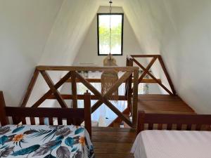 a room with two beds and a window at Le ZANATANY BEACH in Tamatave +118 photos