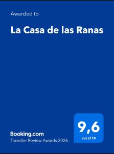 a screenshot of a cell phone with the text awarded to la casa de las at La Casa de las Ranas in Poio