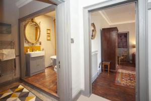a bathroom with a sink and a toilet and a mirror at 2 Bed in Bath oc-bhr35 in Bath +26 photos