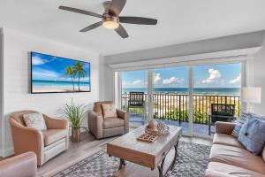 a living room with a view of the ocean at 201 Surfside in Clearwater Beach