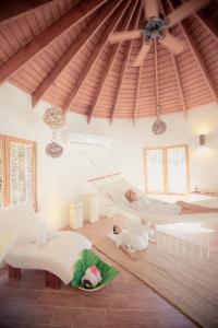 Tempat tidur dalam kamar di Sublime Samana