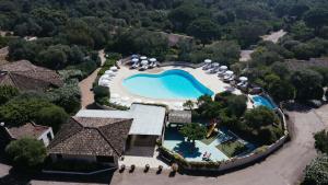 an aerial view of a resort with a swimming pool at Les Hauts de Santa Giulia in Porto-Vecchio