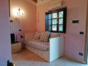 a bedroom with a bed and a window at La Costa Di Gavedo in Gavedo