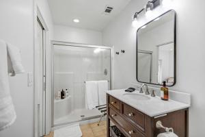a white bathroom with a sink and a mirror at Perfect Friends Getaway in Sonoma in Sonoma +32 photos