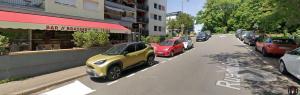 a rendering of cars parked on the side of a street at Chambre Privée Quokka Room in Longeville-lès-Metz