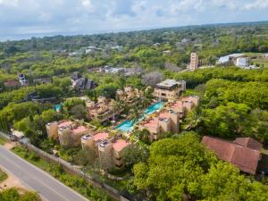 an aerial view of a resort with a swimming pool at Villa Mandhari - Diani Beach in Diani Beach