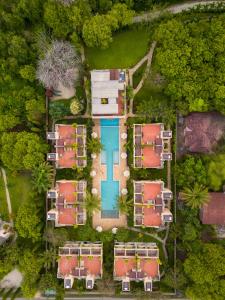 an aerial view of a yard with houses at Villa Mandhari - Diani Beach in Diani Beach