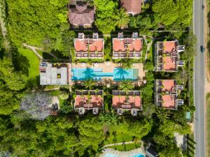 an aerial view of a villa with a swimming pool at Villa Mandhari - Diani Beach in Diani Beach +89 photos