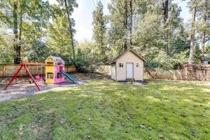 a yard with a playground and a shed at 6BD55B,BrookhavenSleeps 12,Big yard,w poolGate in Atlanta