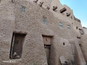 a building in an old stone building at Siwa Shaly in Siwa +20 photos