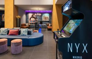 a nintendo wii game room with a video game console at NYX Hotel Madrid by Leonardo Hotels in Madrid