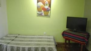 Postel nebo postele na pokoji v ubytování Posada Junco y Capuli