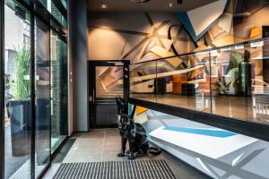 a shop with a display case in a store at NYX Hotel Hamburg by Leonardo Hotels in Hamburg