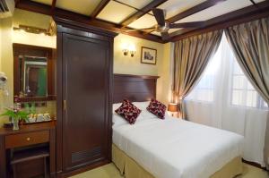 Postel nebo postele na pokoji v ubytování Hotel Kooler Inn