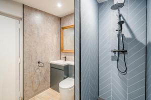 a bathroom with a toilet and a shower at 1 Bed in Austwick oc-r32793 in Eldroth
