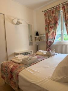 a bedroom with two beds and a window at Loft 212 in Chitenay