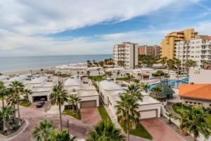 an aerial view of the city and the ocean at Las Palmas Resort in Puerto Peñasco