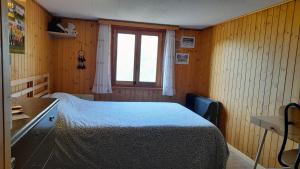 a bedroom with a bed and a window at Chalet del Sole in Quinto +119 photos